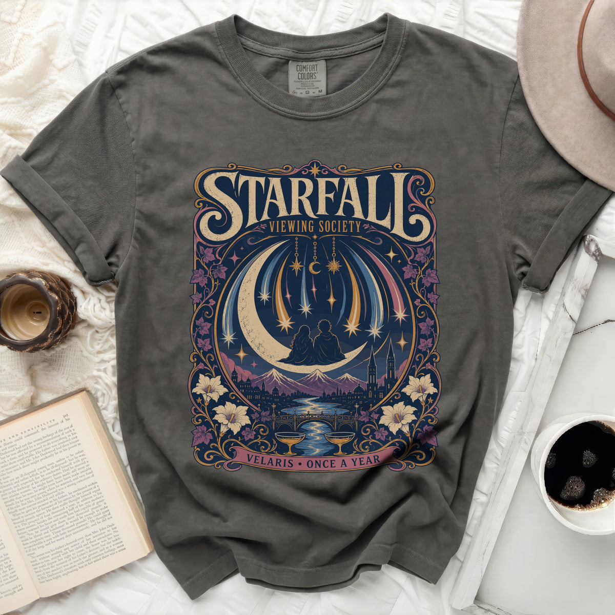Starfall Viewing Society graphic t-shirt with moon, couple, and shooting stars design.