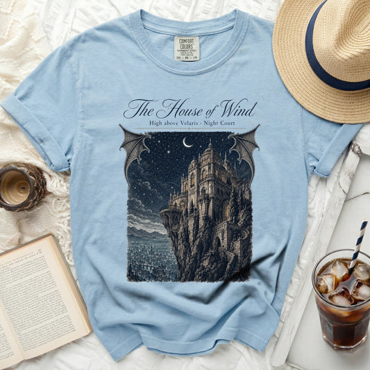 Light blue t-shirt with "The House of Wind, High above Velaris, Night Court" graphic.