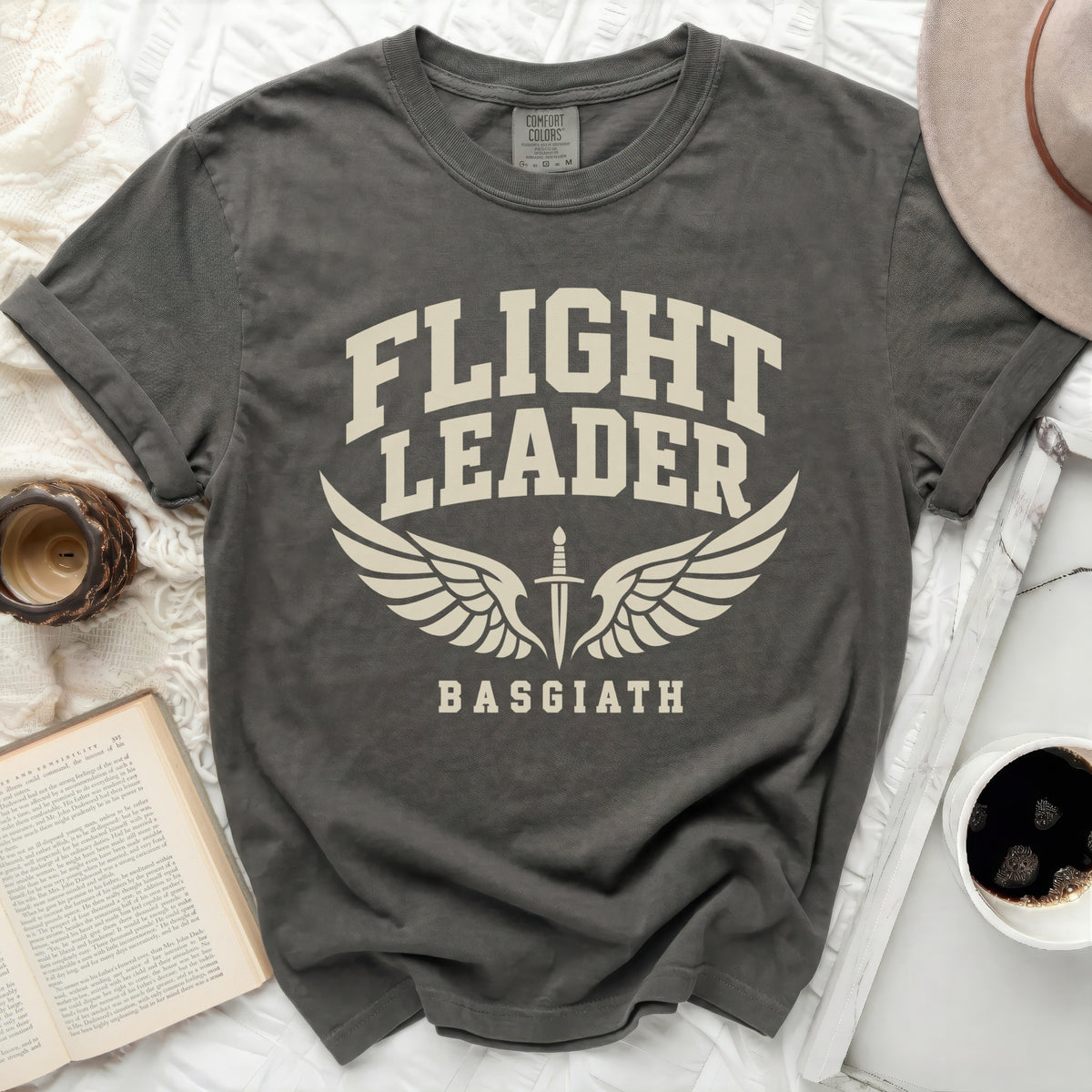 Dark grey t-shirt with "FLIGHT LEADER BASGIATH" text and wing graphic.