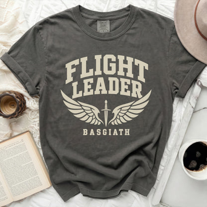 Dark grey t-shirt with "FLIGHT LEADER BASGIATH" text and wing graphic.