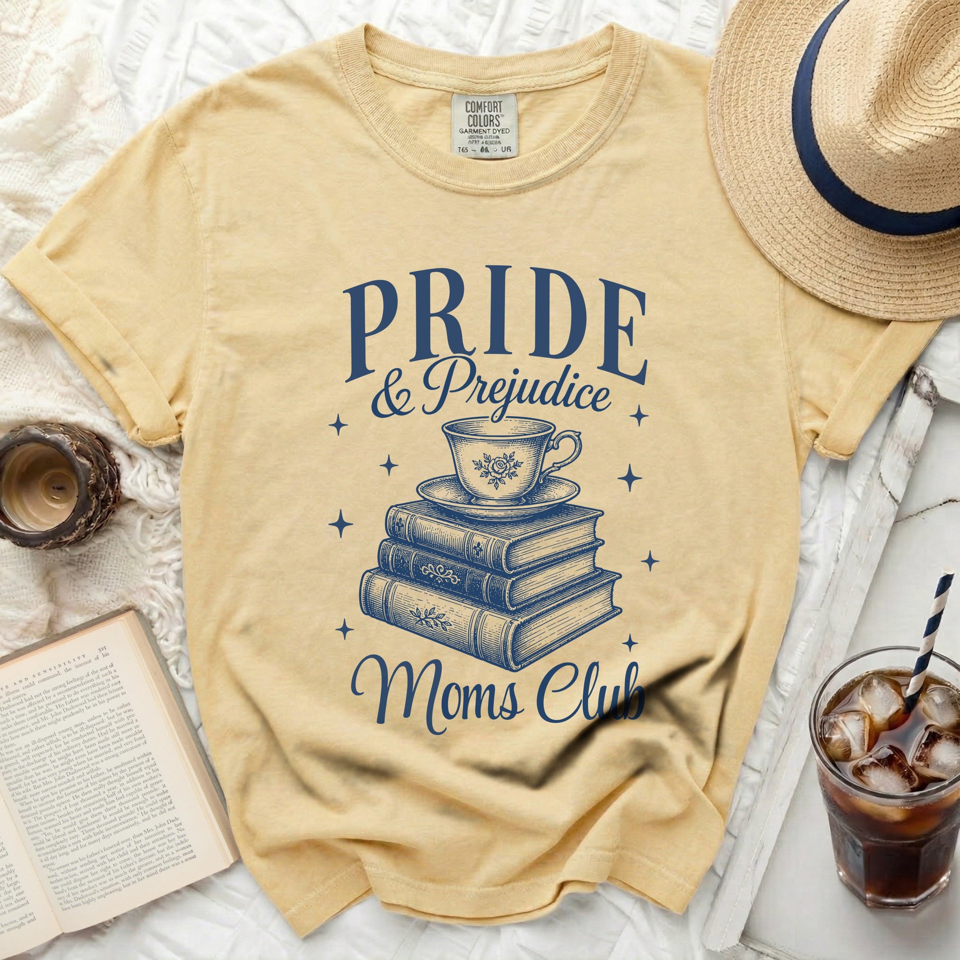 Yellow t-shirt with "Pride & Prejudice Moms Club" graphic.