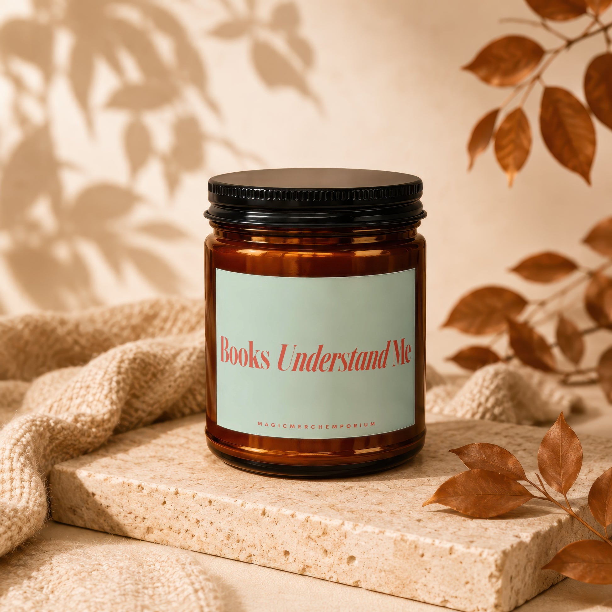 Brown candle with "Books Understand Me" and "Magic Merch Emporium" text on label.