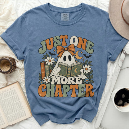 Ghost in bow tie reading book with text "JUST ONE MORE CHAPTER"