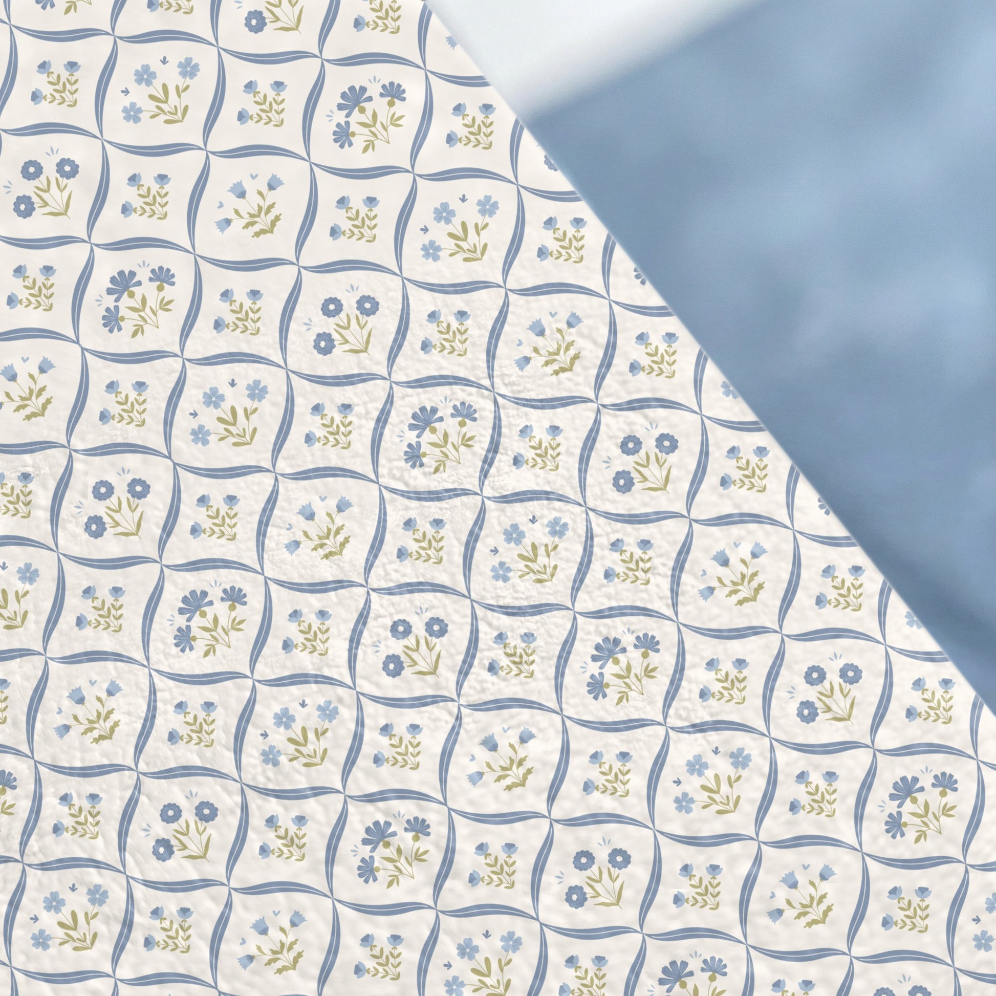 Blue and White Floral Pattern Quilted Blanket