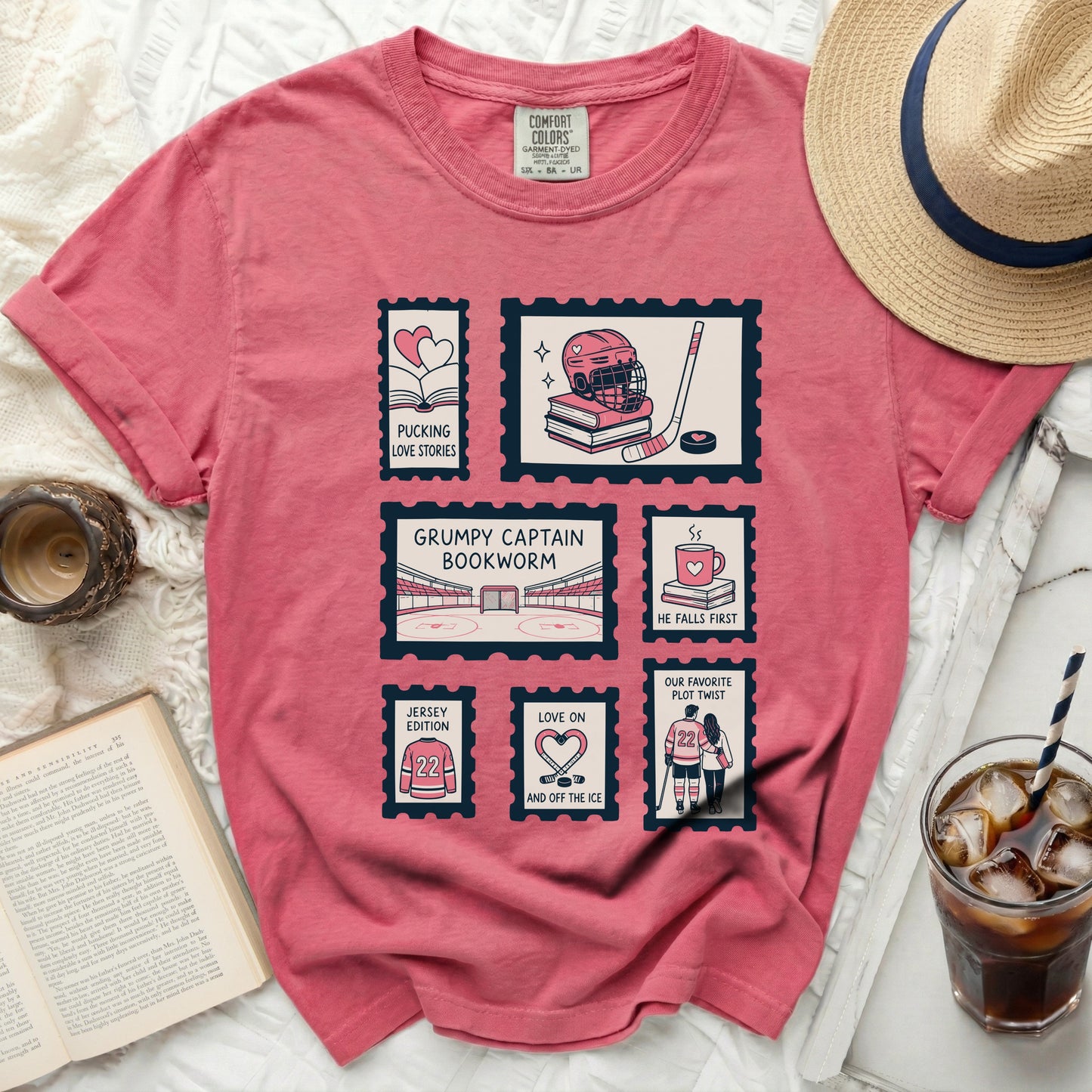 T-shirt with postage stamps featuring hockey, books, and couple.