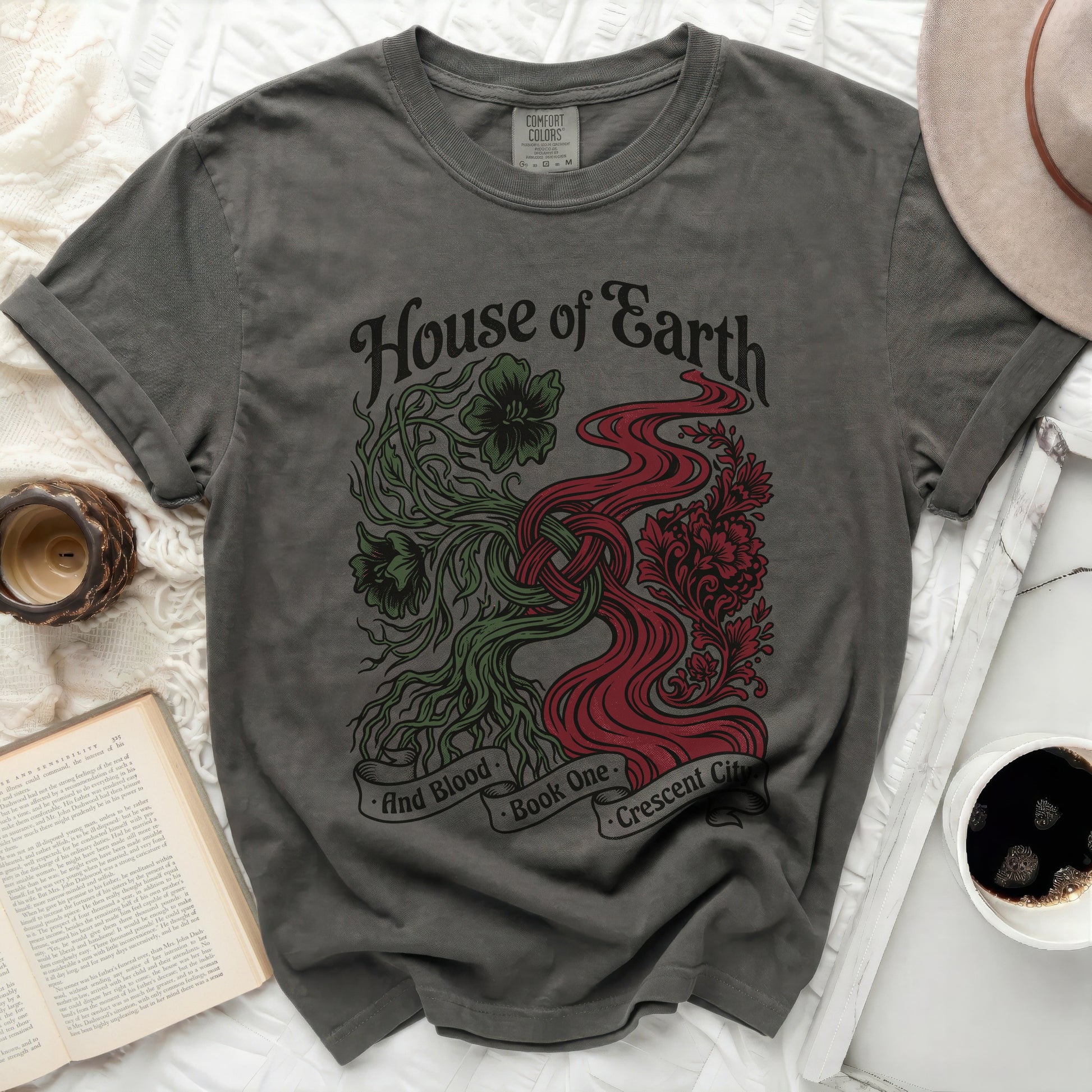 Dark grey t-shirt with "House of Earth and Blood Book One Crescent City" text.