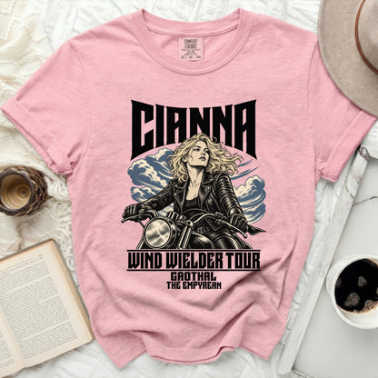 Pink Comfort Colors t-shirt with a graphic of a blonde woman on a motorcycle.