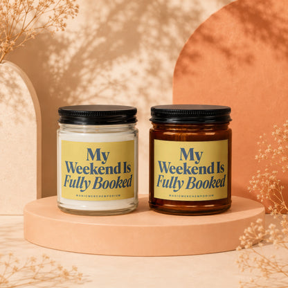 Two candles display yellow labels with blue text: "My Weekend Is Fully Booked".