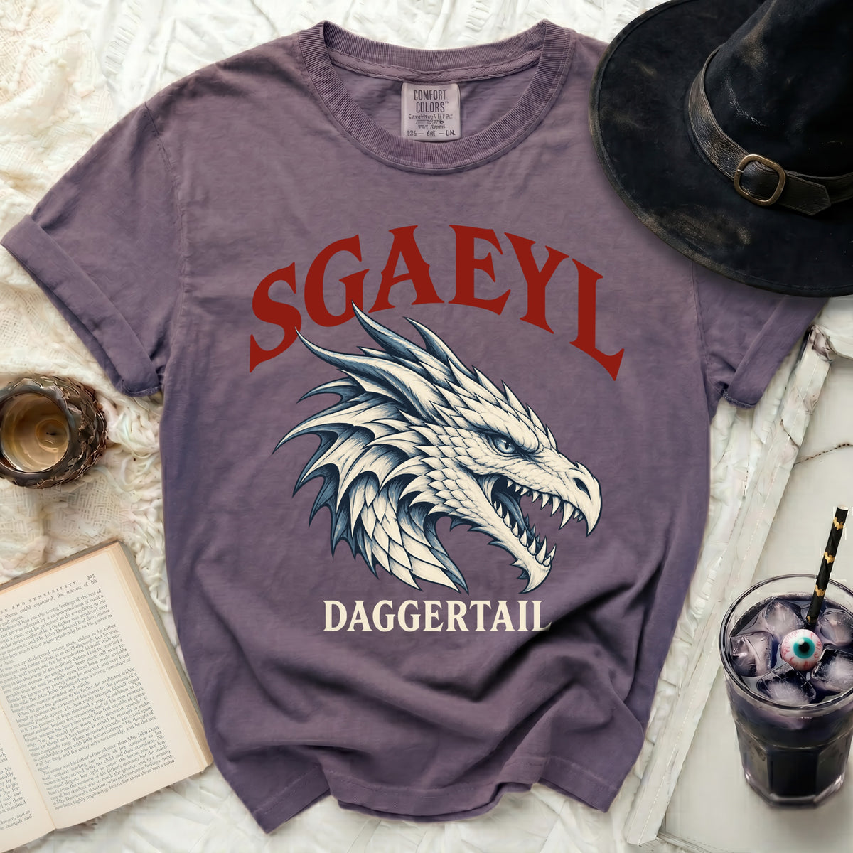 Purple t-shirt with SGAEYL and DAGGERTAIL text and dragon graphic.