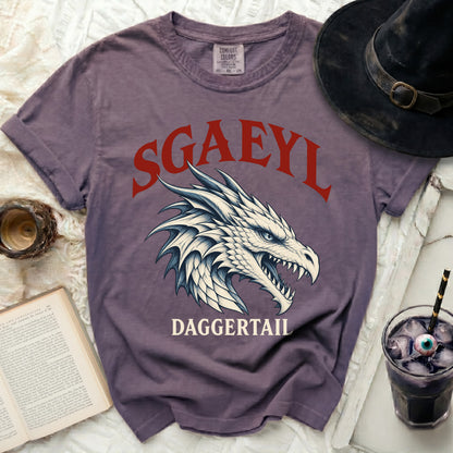 Purple t-shirt with SGAEYL and DAGGERTAIL text and dragon graphic.