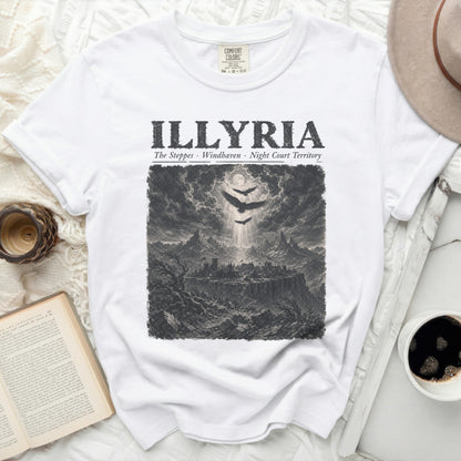 White t-shirt with "ILLYRIA" text and a dark, detailed landscape illustration.