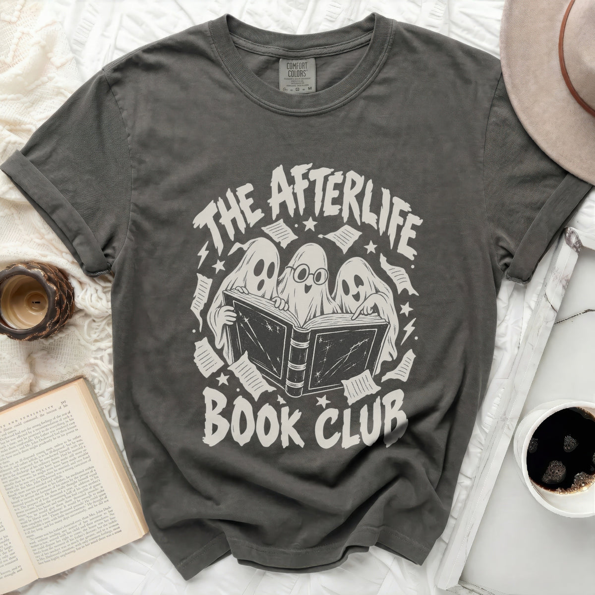 Dark grey t-shirt with "The Afterlife Book Club" and three ghosts reading a book.