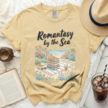 Yellow t-shirt with "Romantasy by the Sea" text and book stack graphic.