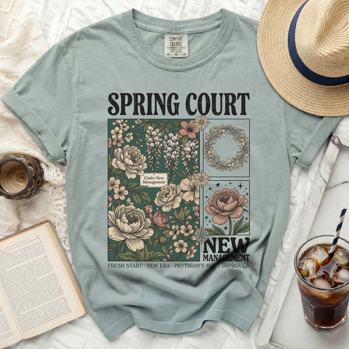 Light green t-shirt with floral graphic and "SPRING COURT" text.