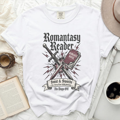 White t-shirt with "Romantasy Reader" and "Smut & Swords" graphic.