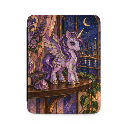 Stained glass unicorn with wings and purple mane on a table overlooking a city skyline.