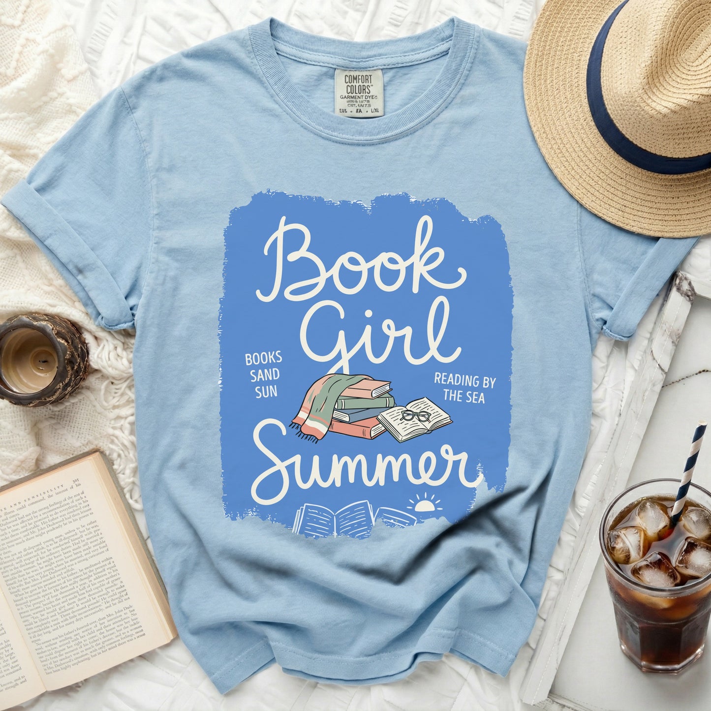 Light blue t-shirt with "Book Girl Summer" graphic and text.