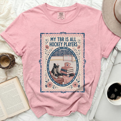 Pink t-shirt with "My TBR is All Hockey Players" text and hockey illustration.