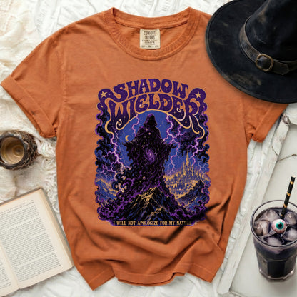 Orange t-shirt with "Shadow Wielder" design and quote.