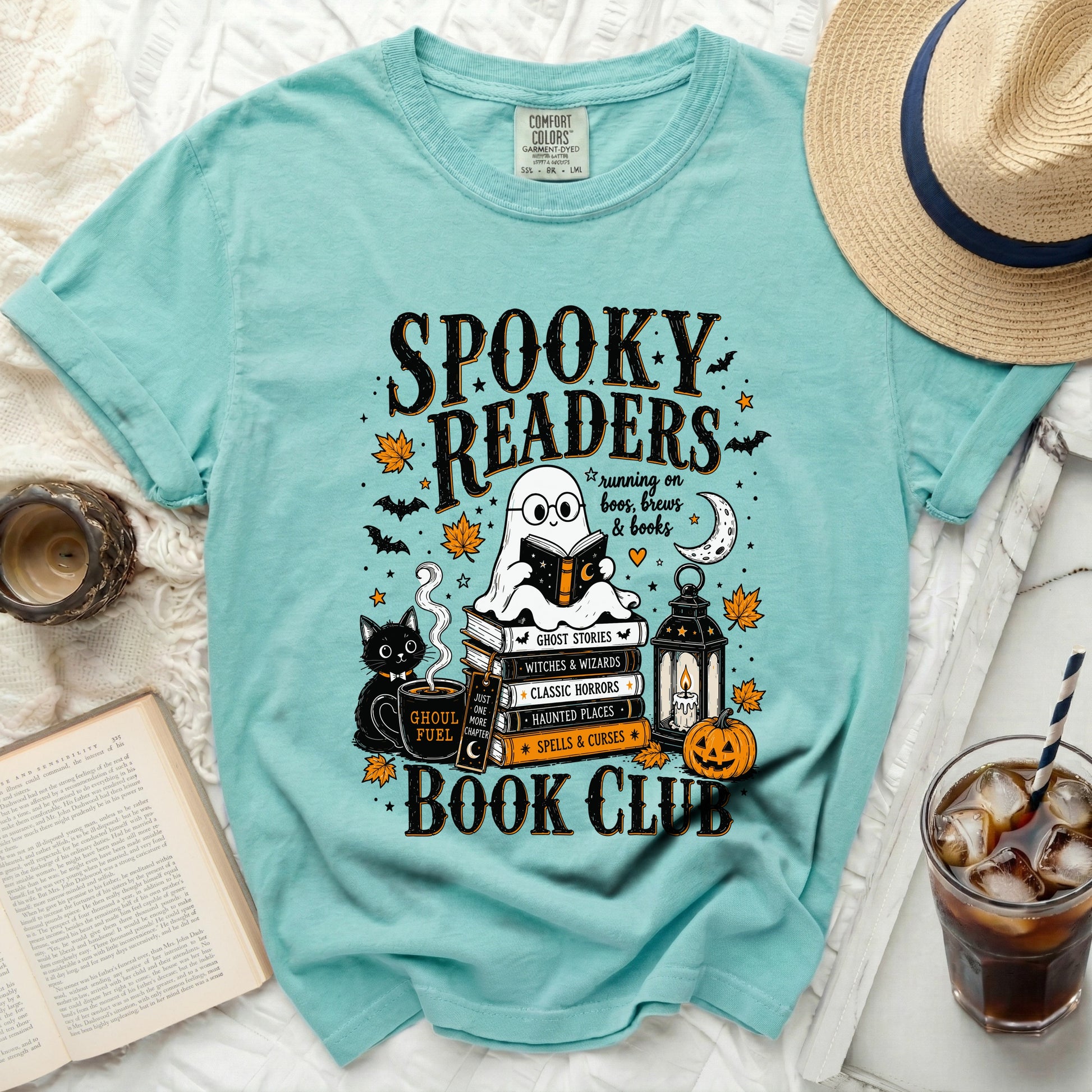 Aqua t-shirt reading "Spooky Readers Book Club" with Halloween graphics.