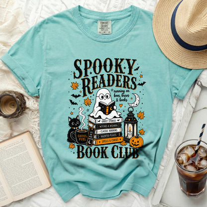 Aqua t-shirt reading "Spooky Readers Book Club" with Halloween graphics.
