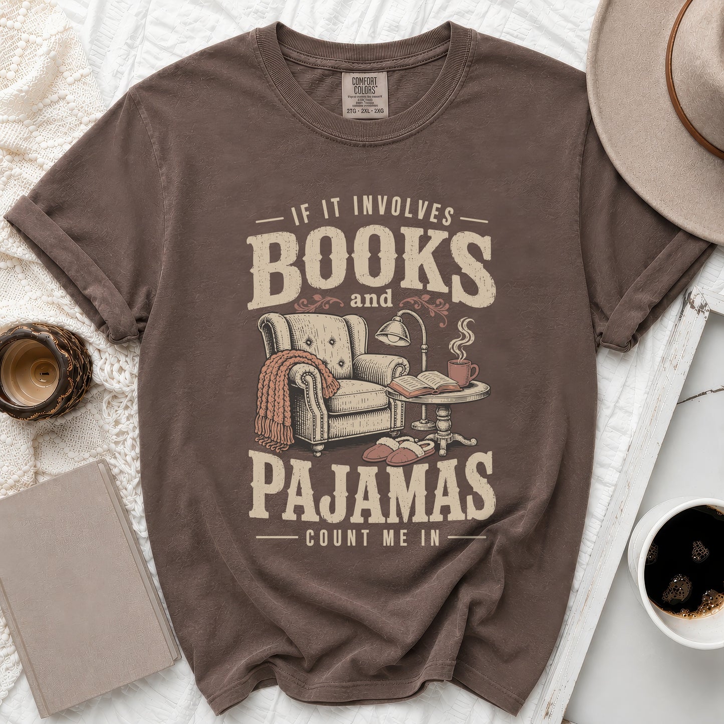 T-shirt with "If it involves Books and Pajamas Count Me In" text and illustration.