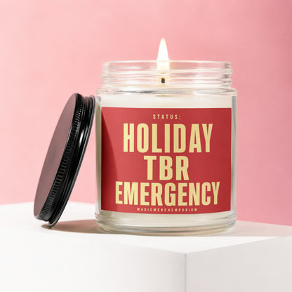 Candle with label "Status: Holiday TBR Emergency" in a jar.