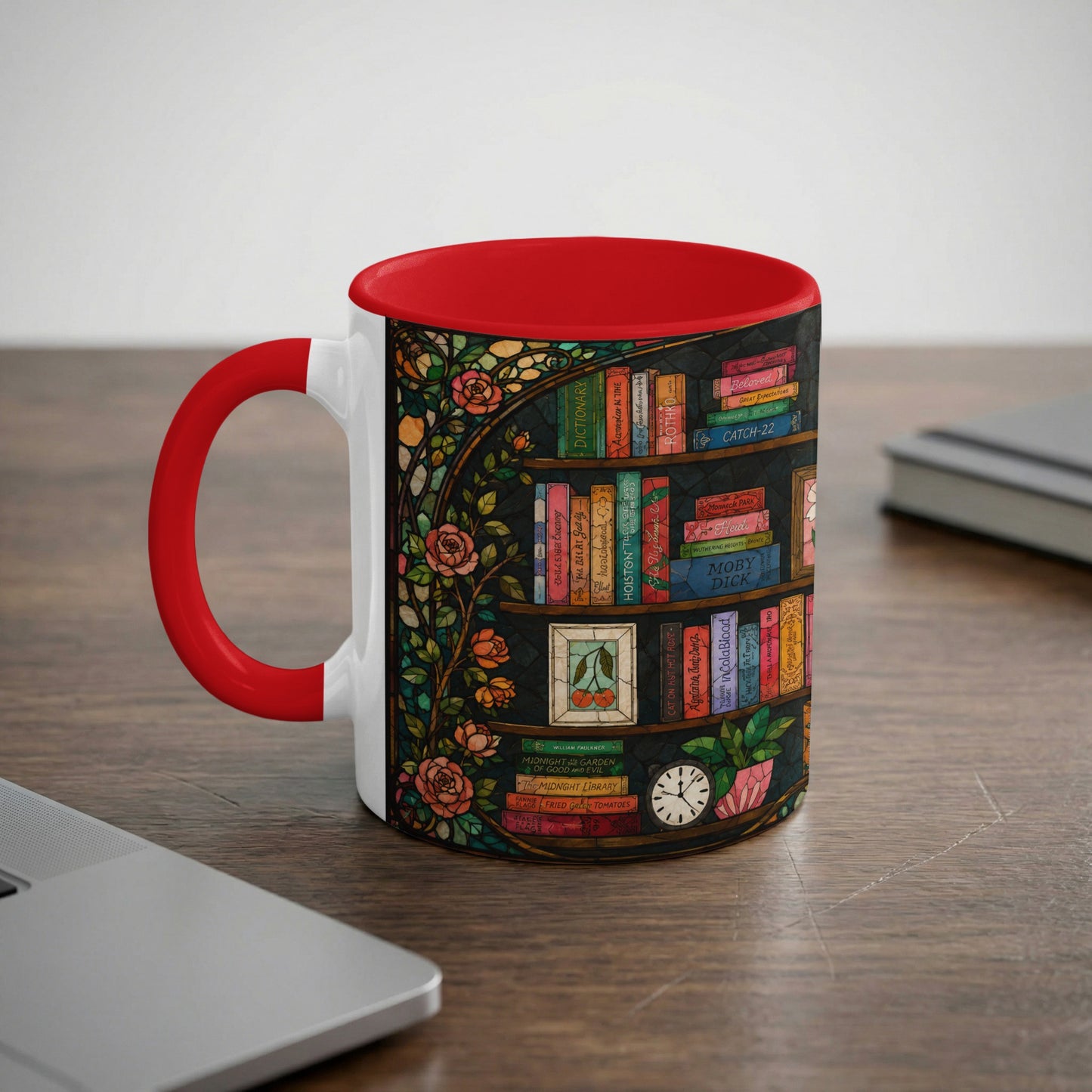 White mug with red handle featuring a stained-glass bookshelf design with book titles.