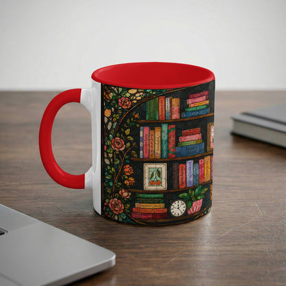 White mug with red handle featuring a stained-glass bookshelf design with book titles.