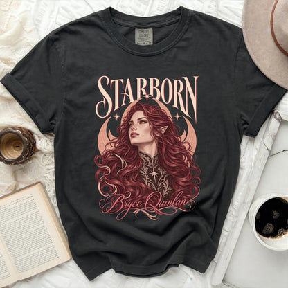 Dark t-shirt with "Starborn Bryce Quinlan" text and an illustration of a woman.