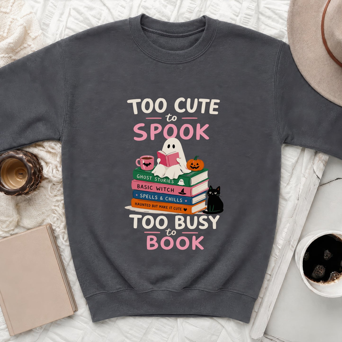 Gray sweatshirt with Halloween graphic: ghost reading, books, and cat, saying "Too Cute to Spook".