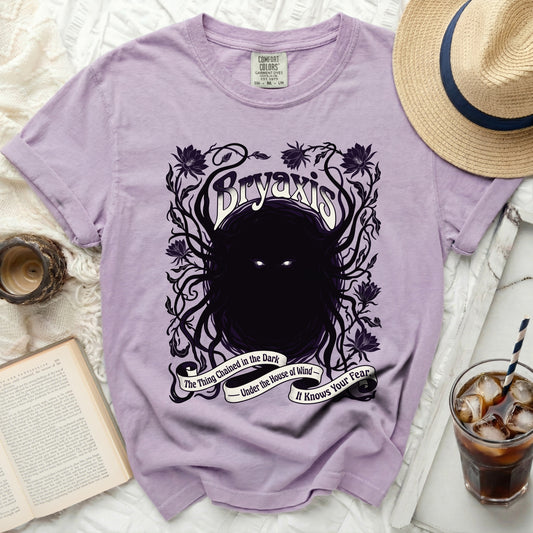 Purple t-shirt with "Bryaxis" and gothic floral design.