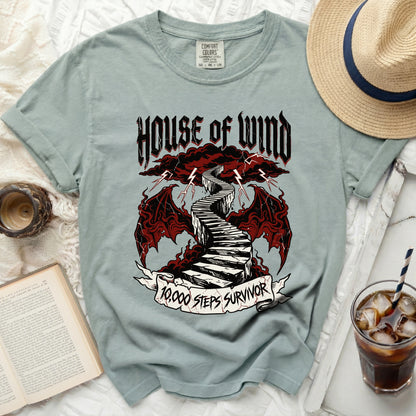 T-shirt with "House of Wind 10,000 Steps Survivor" graphic.