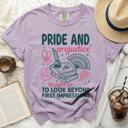 Lavender t-shirt with "Pride and Prejudice" design and literary elements.