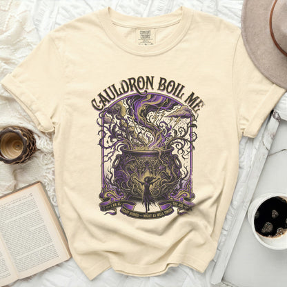 Cream t-shirt with "Cauldron Boil Me" and witchy illustration.