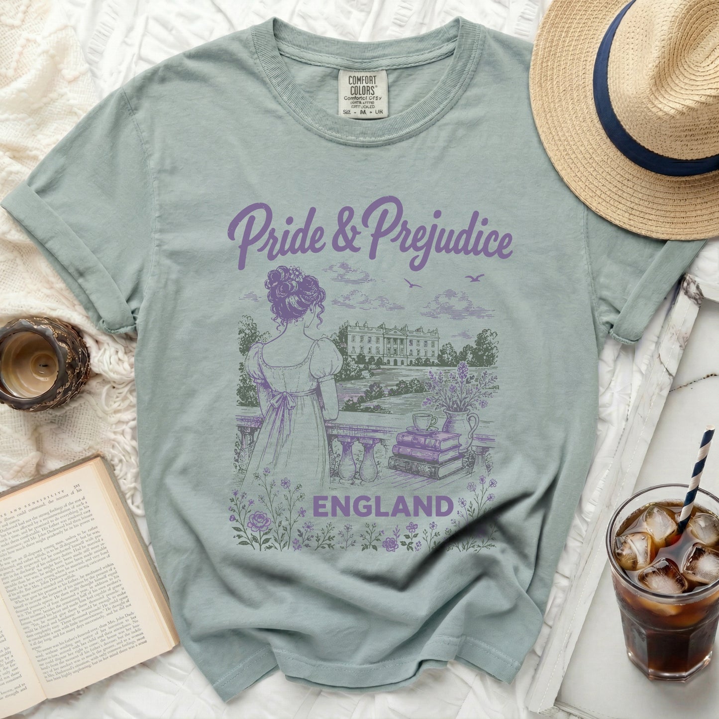 Light sage green t-shirt with "Pride & Prejudice ENGLAND" graphic.