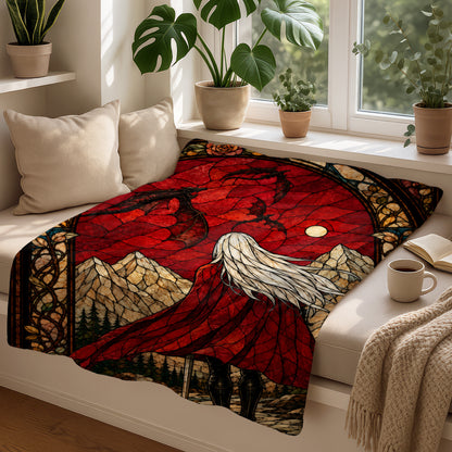 Dragon stained glass blanket design with a woman in a red cloak and mountains.