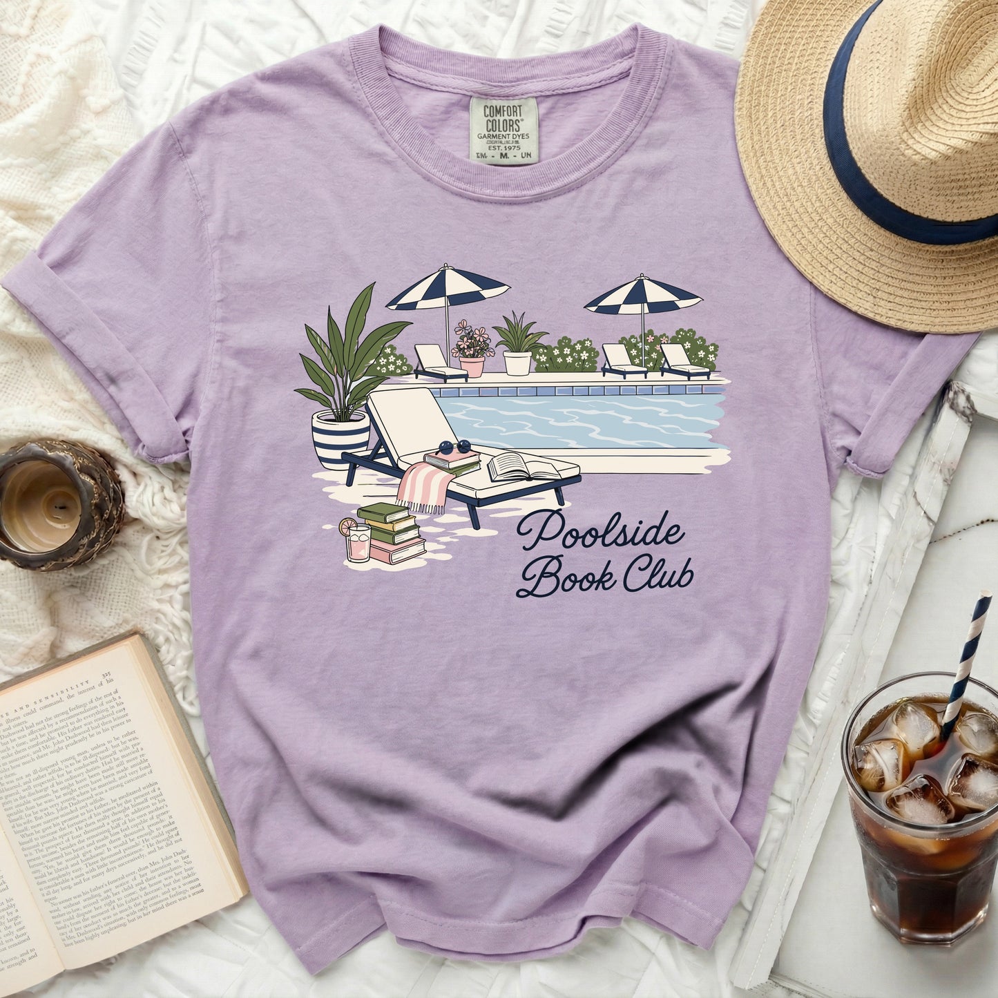 Lavender t-shirt with "Poolside Book Club" text and poolside graphic.