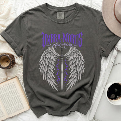 Dark grey t-shirt with purple "Umbra Mortis Hunt Athalar" text and winged sword design.