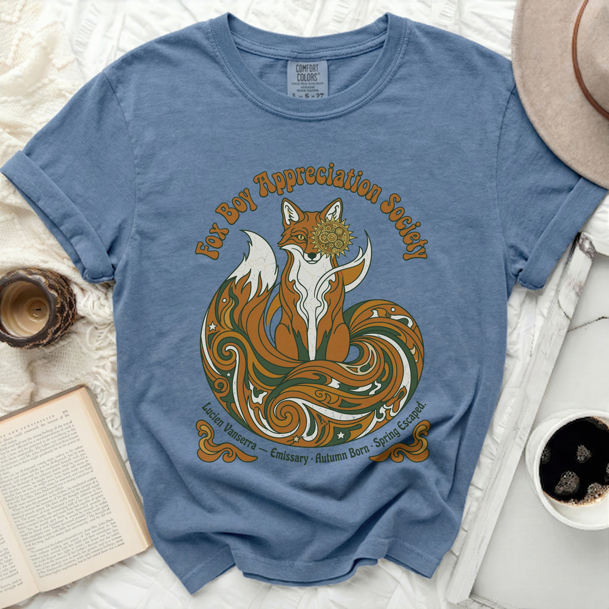 Blue t-shirt with a graphic of a fox and "Fox Boy Appreciation Society" text.