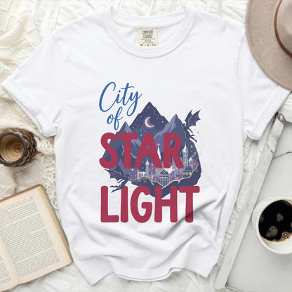 White t-shirt with "City of STAR LIGHT" graphic featuring mountains, moon, stars, and a dragon.