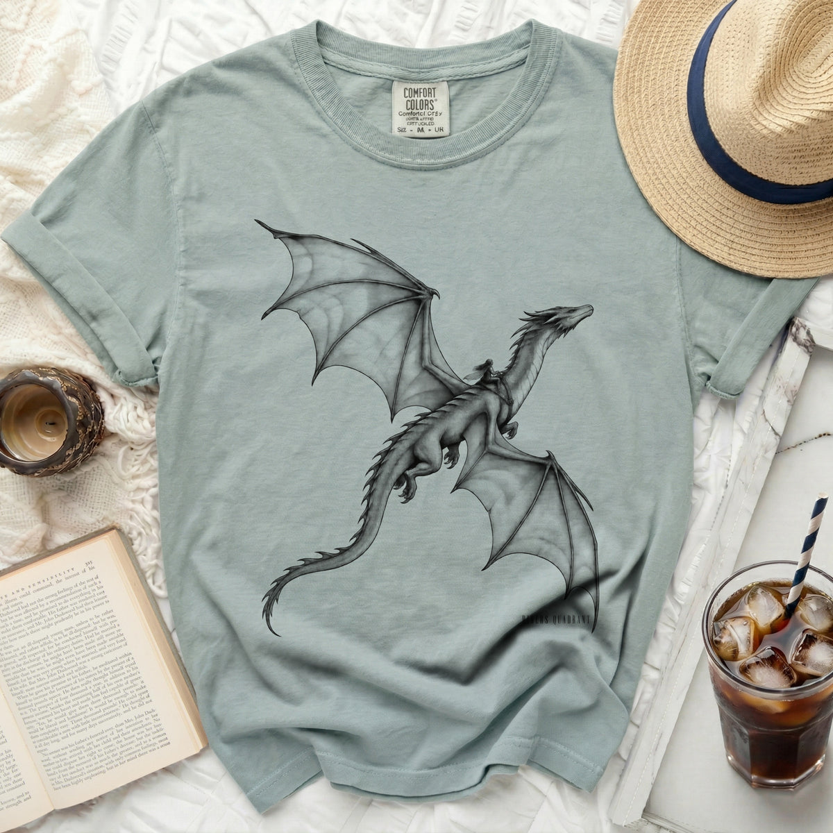 Light blue t-shirt with a dragon and rider graphic, Comfort Colors brand.