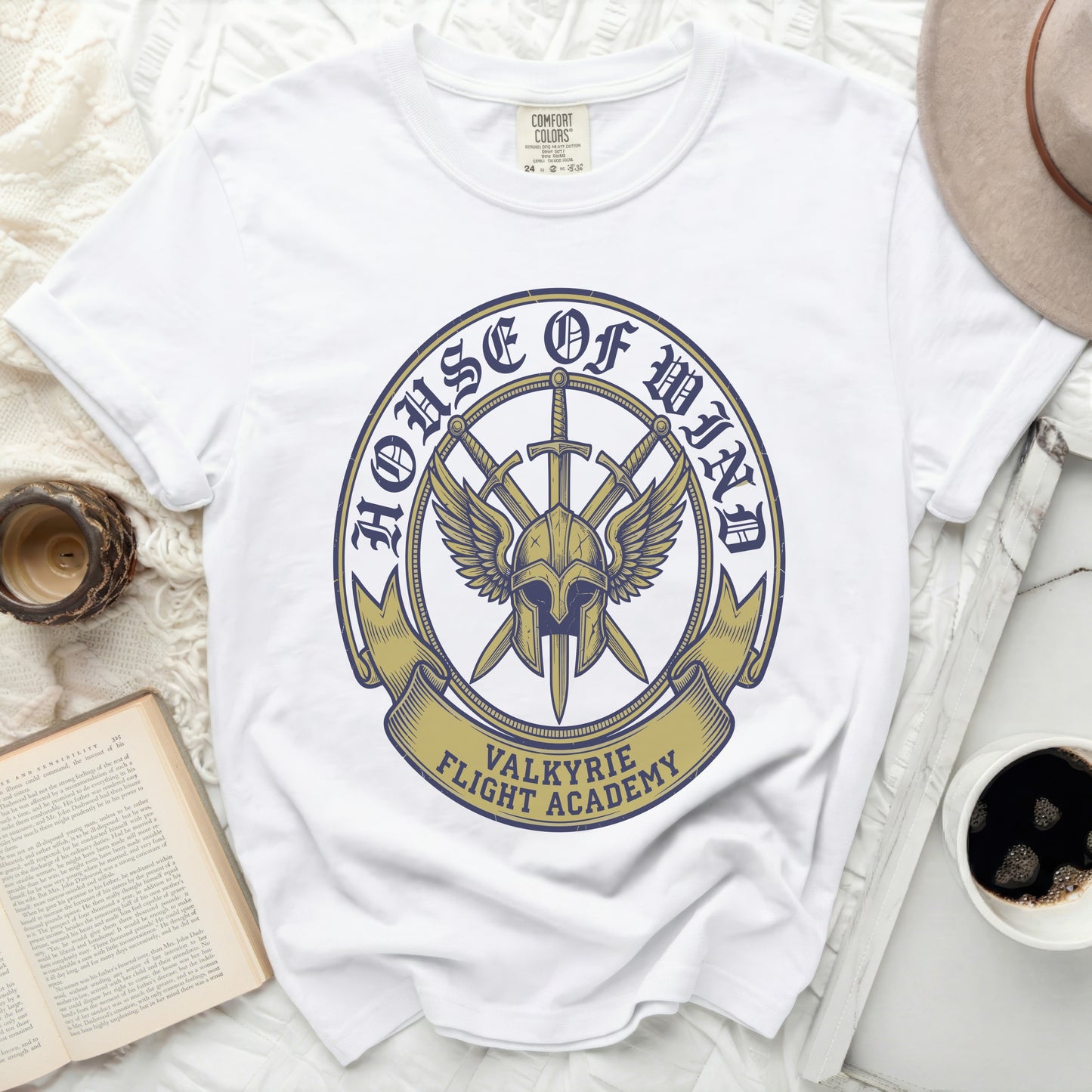 White t-shirt with "House of Wind Valkyrie Flight Academy" crest design.