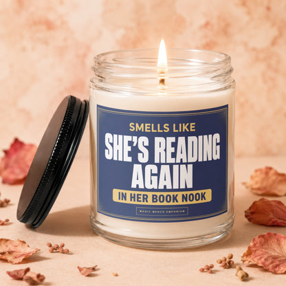 Scented candle with text "Smells like she's reading again in her book nook".