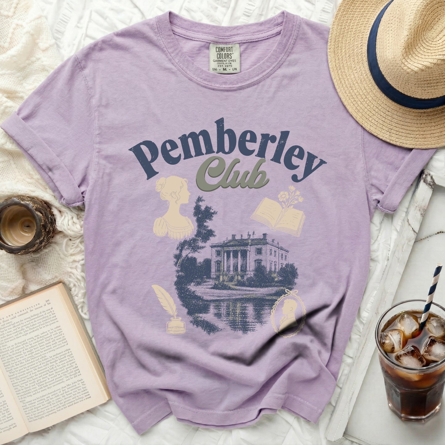 Lilac t-shirt with "Pemberley Club" text and regency-style illustration.