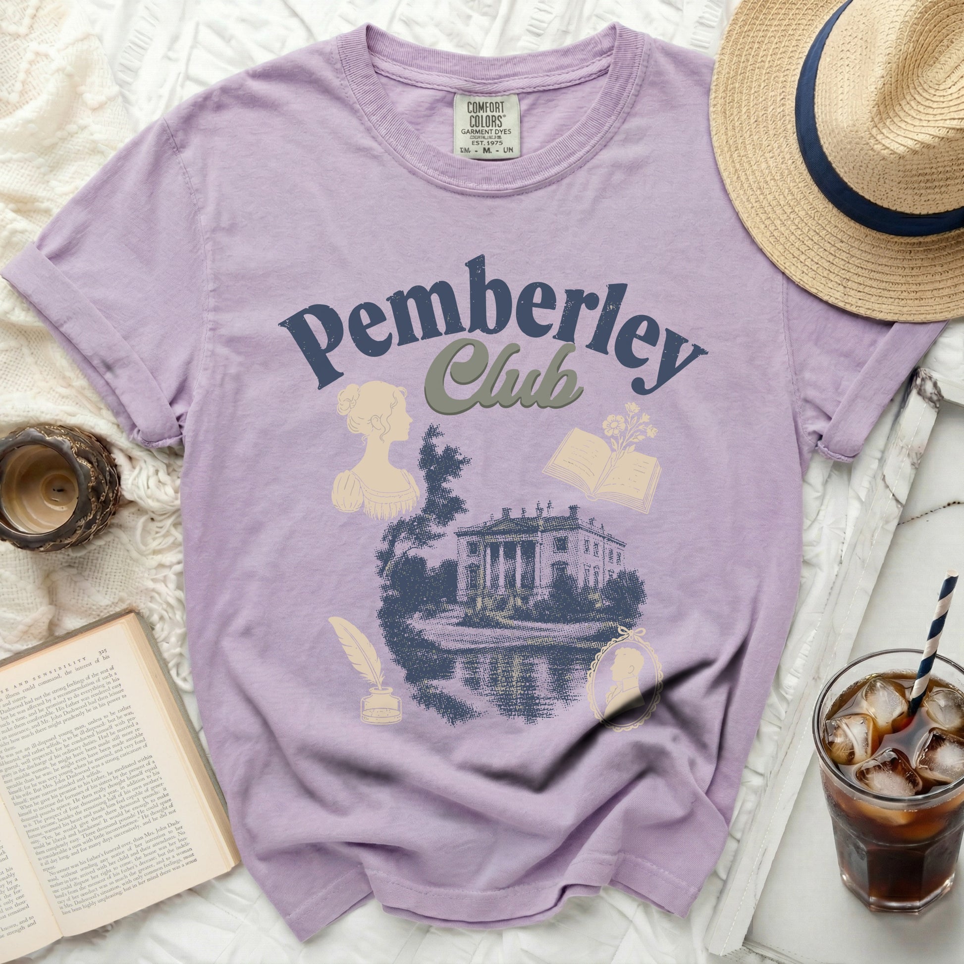 Lilac t-shirt with "Pemberley Club" text and regency-style illustration.