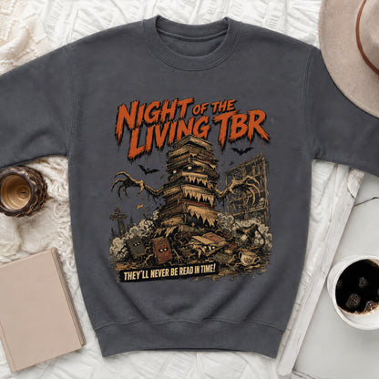 Crewneck sweatshirt with "Night of the Living TBR" and book monster graphic.