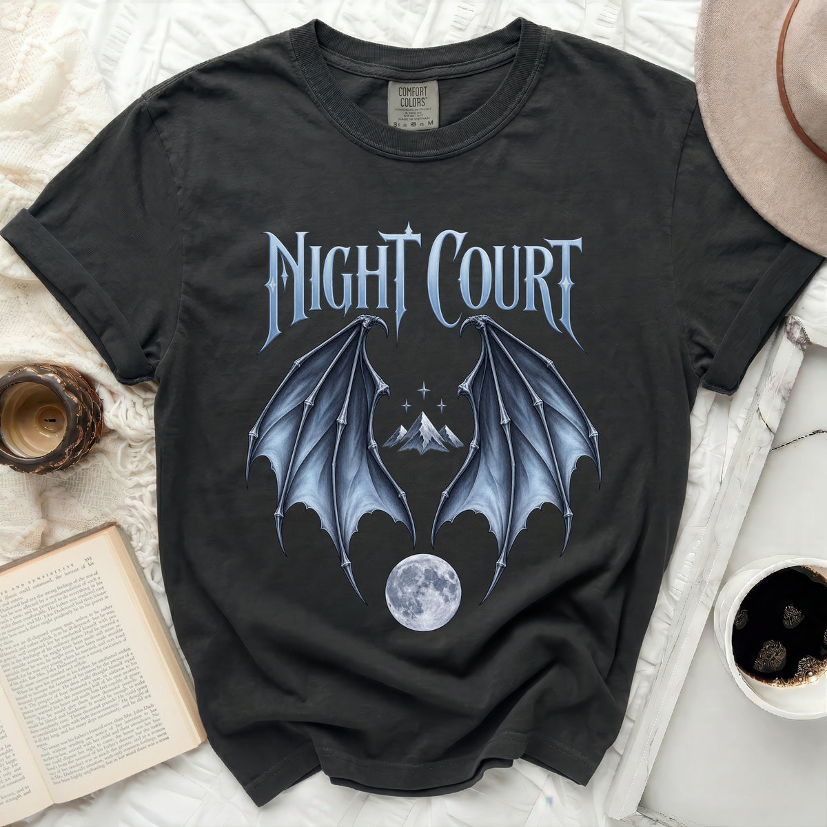 Dark t-shirt with "Night Court" text, dragon wings, mountains, and moon graphic.