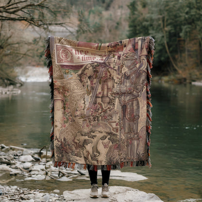 A person stands in front of a large tapestry depicting a knight on a horse, with a river and forest in the background.