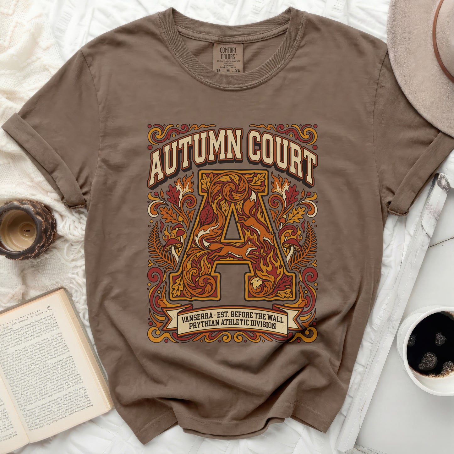 Brown t-shirt with "Autumn Court Vanserra Prythian Athletic Division" text and ornate graphic.